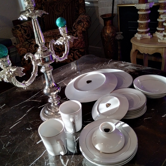Regent fine china and beautiful silver colored candelabra.